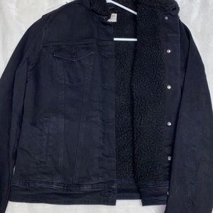 Black jean jacket with soft material on the inside